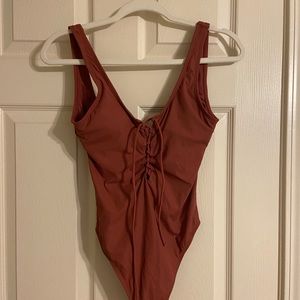 Xhiliration one piece